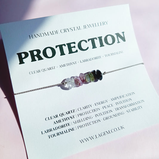 Handmade protection crystal bracelet UK with Black Tourmaline, Labradorite, Amethyst & Clear Quartz. Energy shield bracelet for clarity, balance & daily grounding.